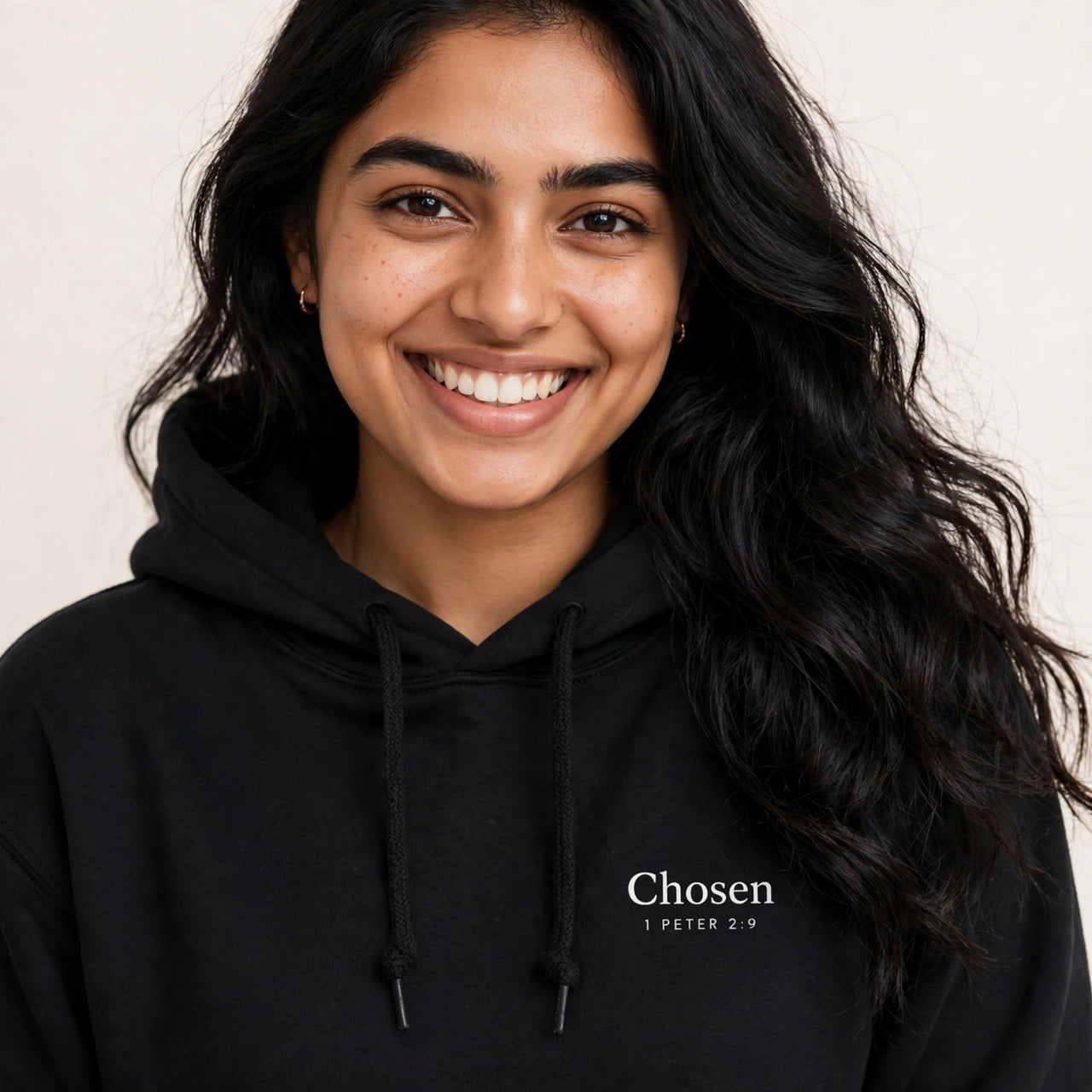 Woman wearing the Chosen hoodie in black