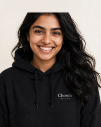 Thumbnail for Woman wearing the Chosen hoodie in black