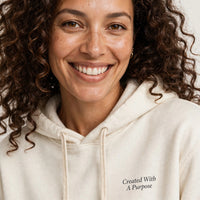 Thumbnail for Woman wearing the Created With A Purpose hoodie in cream