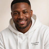 Thumbnail for Man wearing the Created With A Purpose hoodie in white