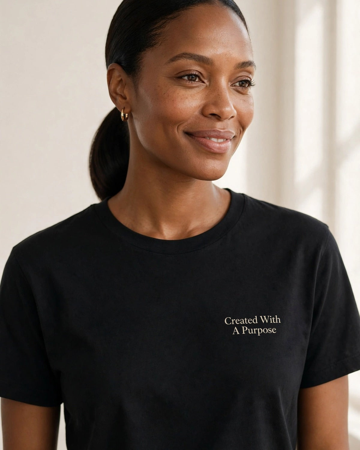 Created With A Purpose tee in black, small left-chest print