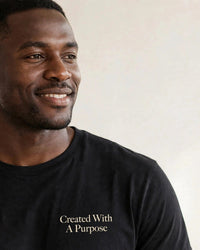 Thumbnail for Man wearing the Created With A Purpose tee in black