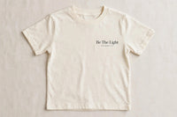 Thumbnail for Black kids t-shirt with cream Be The Light Matthew 5:14 print on left chest - Christian kids shirt