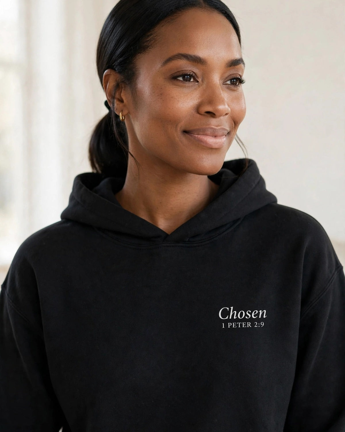 Chosen hoodie in black, small left-chest print