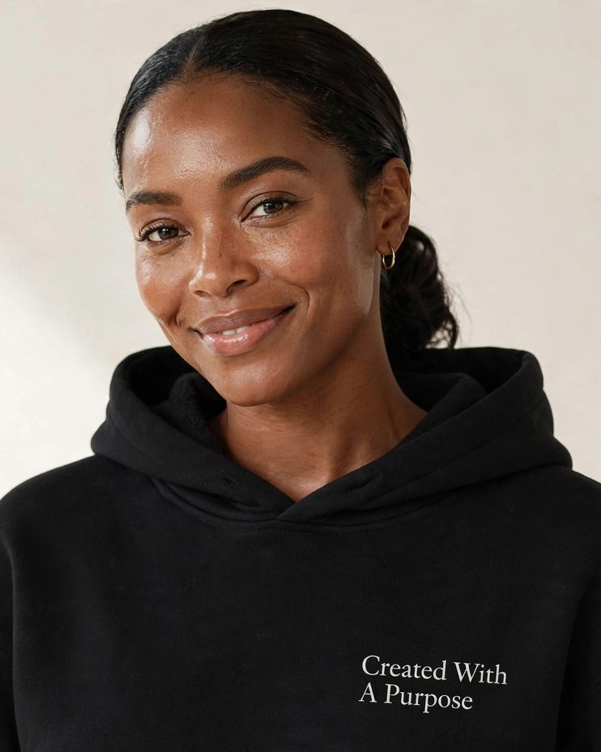 Created With A Purpose hoodie in black, small left-chest print
