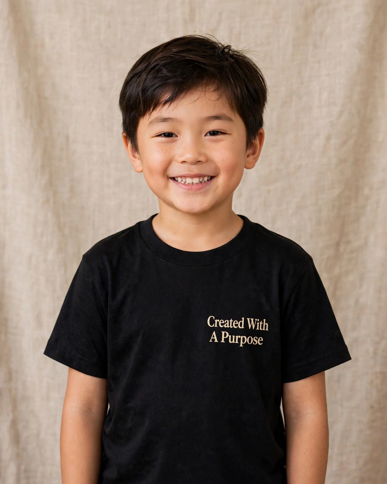 Kids tee mockup — Created With A Purpose, Black