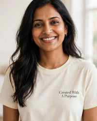 Thumbnail for Woman wearing the Created With A Purpose tee in cream