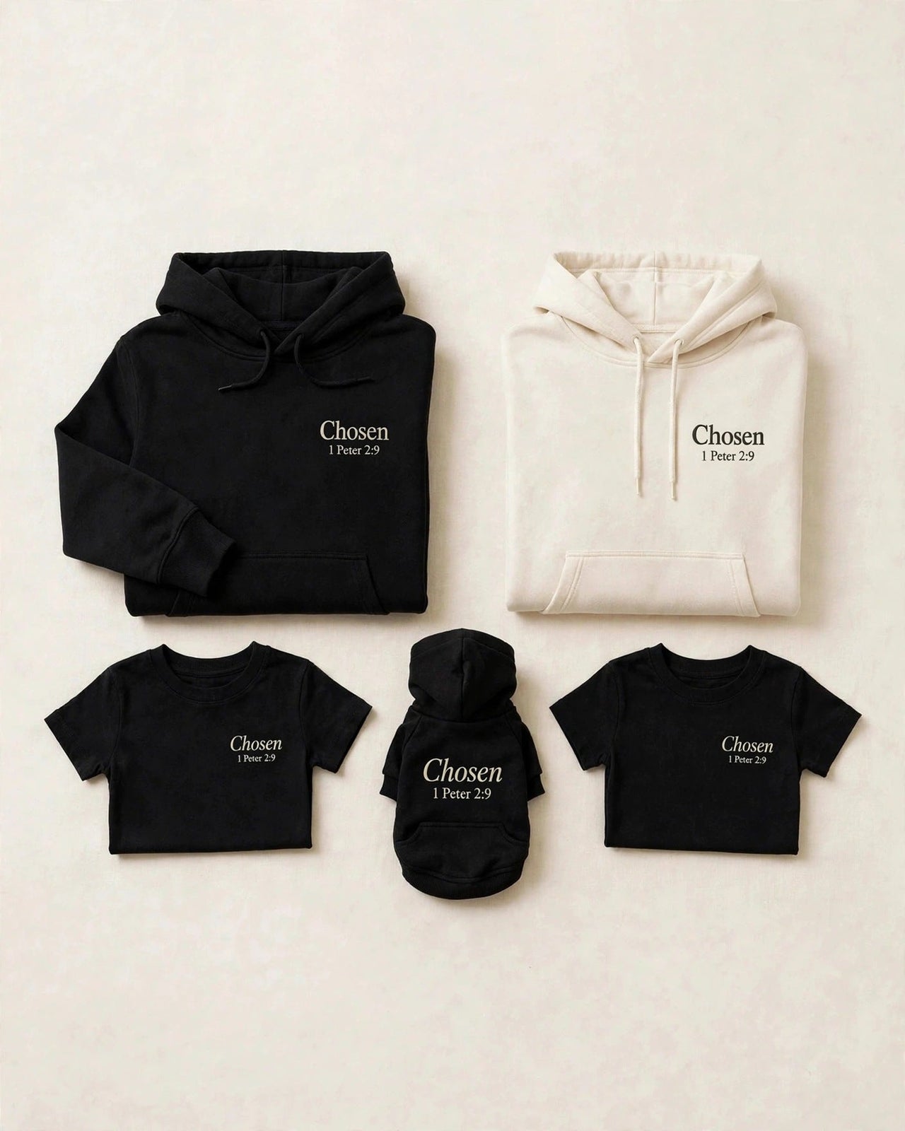 Family matching set flat lay - two adult Chosen hoodies, two kids Chosen tees, and a Chosen dog hoodie - matching family outfits